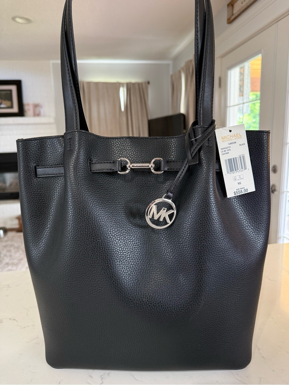 Michael Kors Black Pebbled Leather Tote with MK Pendant